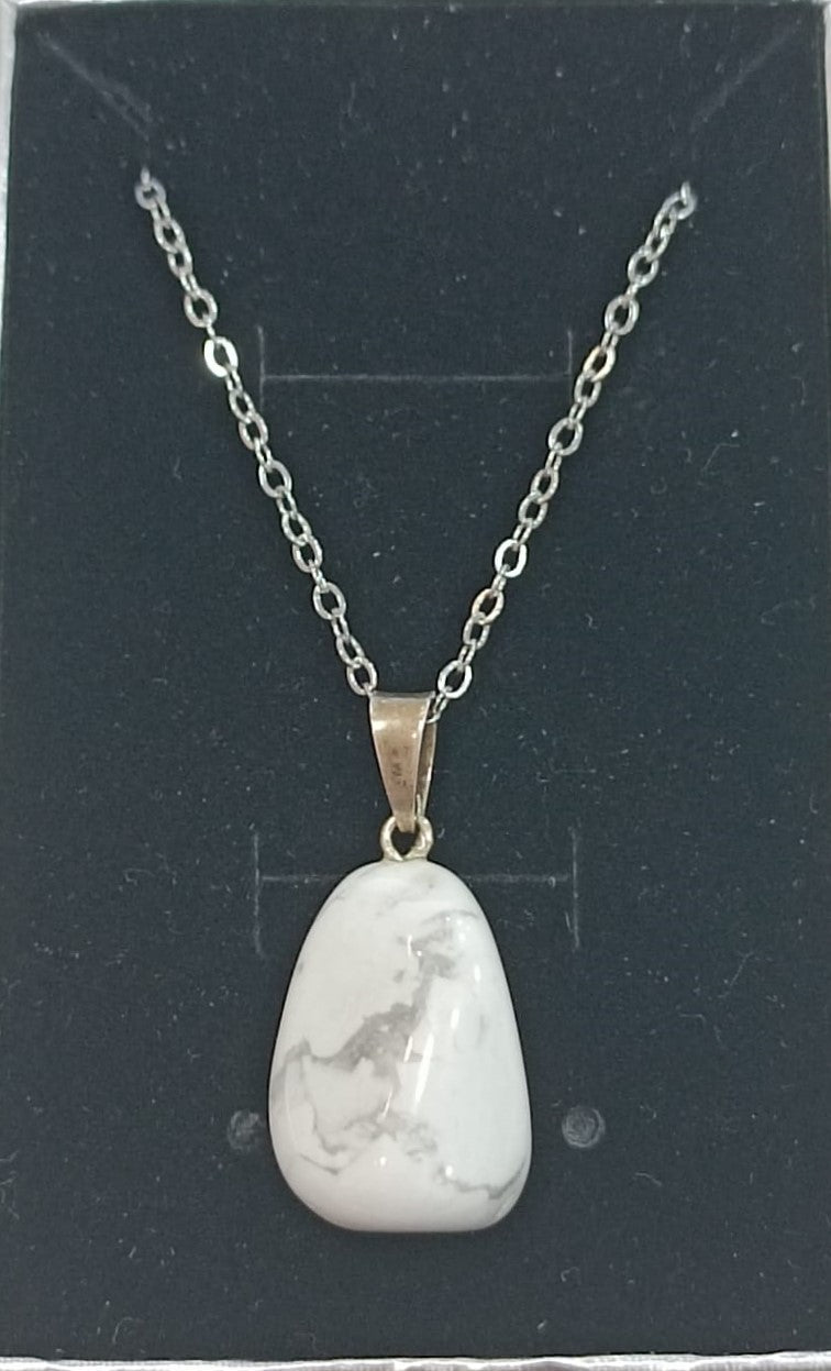Colgante con anilla de plata variado pulido