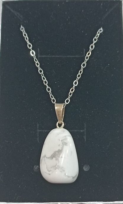 Colgante con anilla de plata variado pulido
