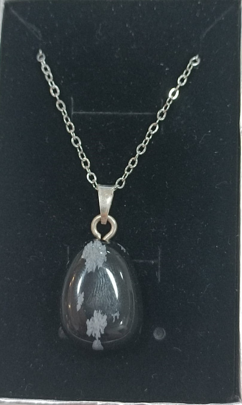 Colgante con anilla de plata variado pulido