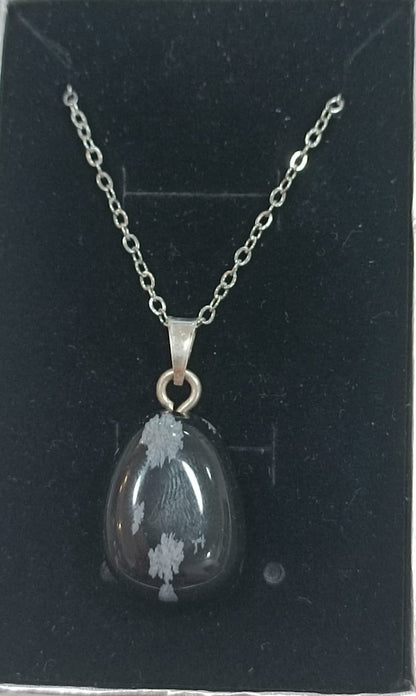 Colgante con anilla de plata variado pulido