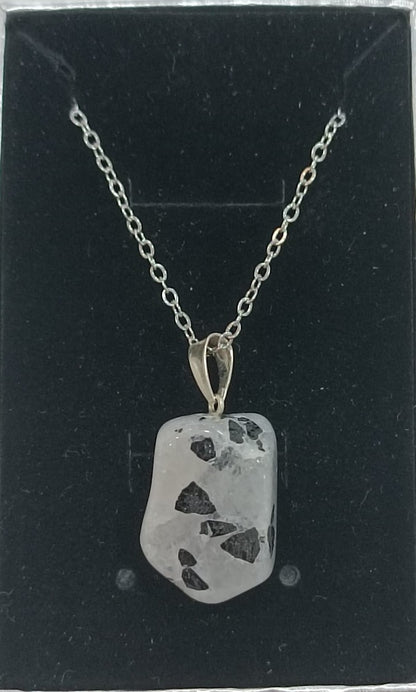 Colgante con anilla de plata variado pulido