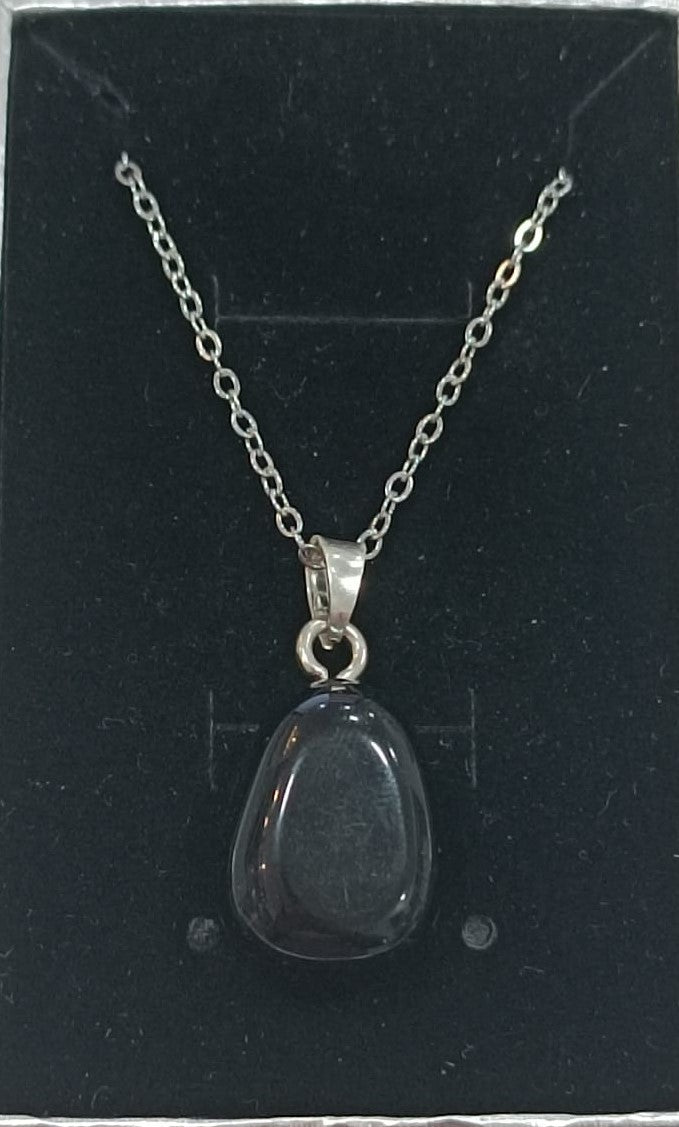 Colgante con anilla de plata variado pulido