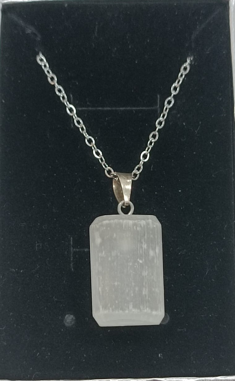 Colgante con anilla de plata variado pulido