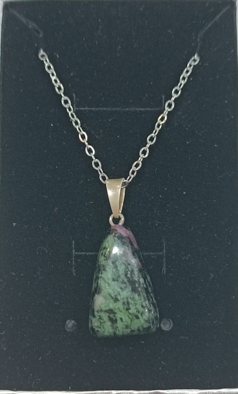 Colgante con anilla de plata variado pulido