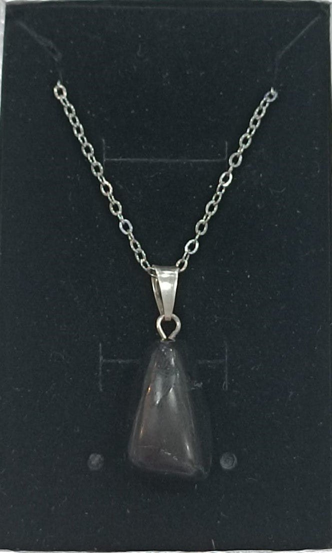 Colgante con anilla de plata variado pulido