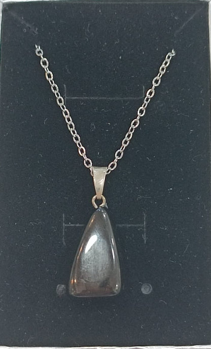 Colgante con anilla de plata variado pulido