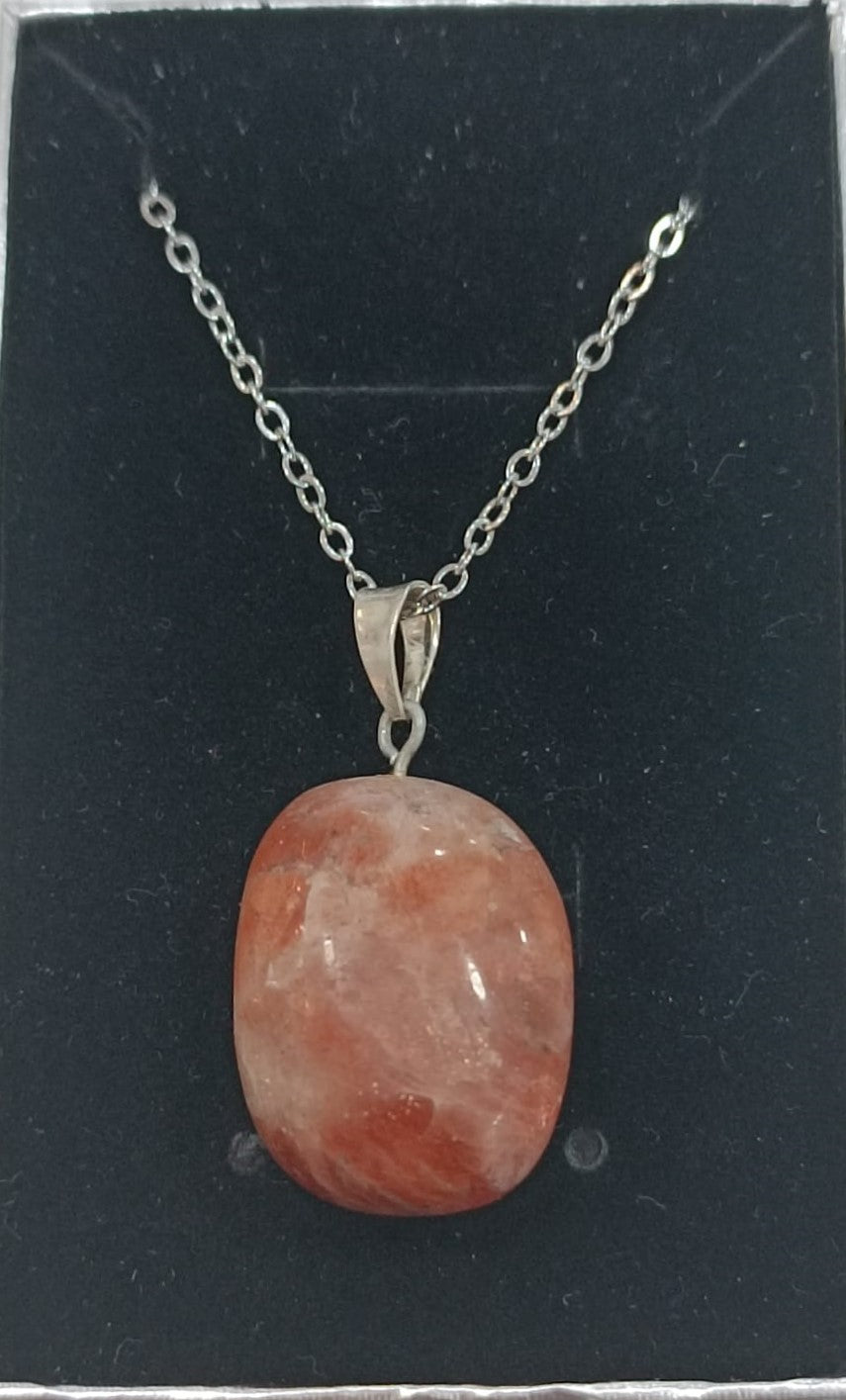 Colgante con anilla de plata variado pulido