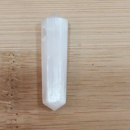 Colgante con agujero variado biterminado